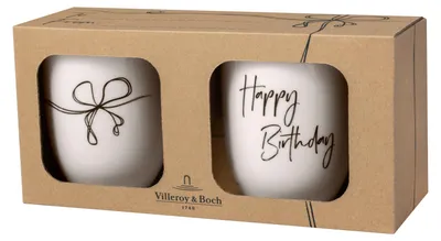 Imagen del producto de Juego de dos tazas "Happy Birthday". Dimensiones: 115 x 80 x 104 mm. Capacidad: 290 ml. Marca: Villeroy & Boch. Número de artículo: 1016218406. Código EAN: 4003686439351