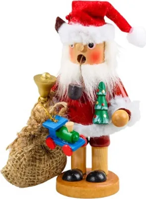 Ein Räuchermännchen das einen Nikolaus darstellt, der einen Sack voller Geschenke trägt.