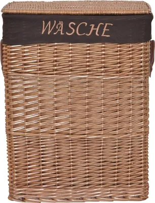A close-up view of a wicker laundry basket with a dark fabric band around the top that has the word "WÄSCHE" embroidered on it.