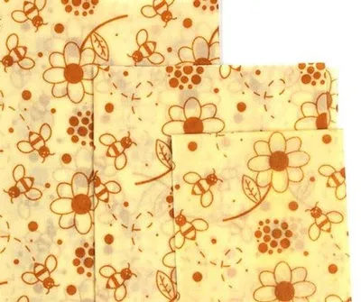 Produktbild von Wiederverwendbare Bienenwachstücher – 3 Größen mit Blumen- und Bienenmuster