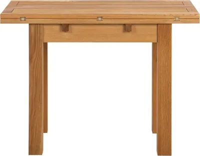 A wooden dining table is shown against a white background.