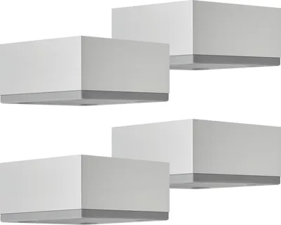 Four identical furniture feet are arranged in a staggered pattern against a white background.