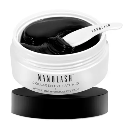A jar of black collagen eye patches with a white applicator, presented on a black base against a white background.