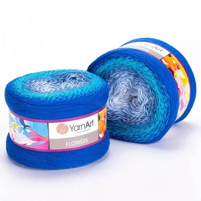 Two balls of gradient yarn on a white background.