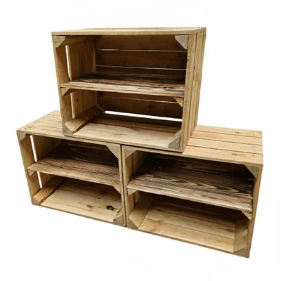 Three wooden crates stacked and arranged to form shelves, against a white background.