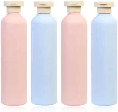 Produktbild von PolkaHome® Reisflaschen Set - 4 Stück nachfüllbare Behälter mit Tragetasche - auslaufsicher & leicht, 260 ml, Rosa/Blau
