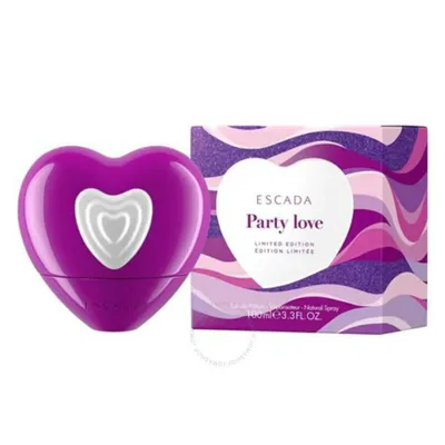 A purple heart-shaped perfume bottle and its packaging are displayed against a white background.