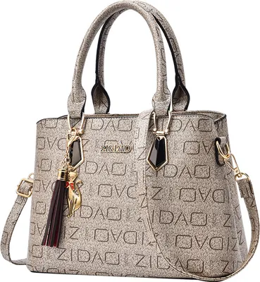 Produktbild von STILVORA Handtaschen, Damen Handtasche mit Anhänger, Modische Schultertasche mit Print & stylischem Accessoire für Alltag & Shopping, Beige