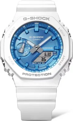 A white Casio G-Shock watch with a blue dial is shown against a white background.