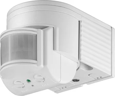 A white motion sensor device is shown against a white background.