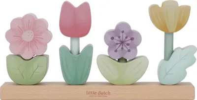A wooden toy with four flower decorations.