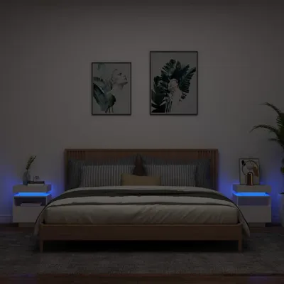 A bedroom scene with a bed and two nightstands.