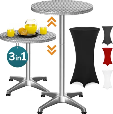 Two silver bar tables, one with drinks and oranges, and several colored table covers.