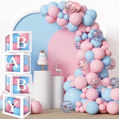 Imagen del producto de Sorpresa para bebés de lujo, con globos rojos y azules, guirnalda, confeti y letras