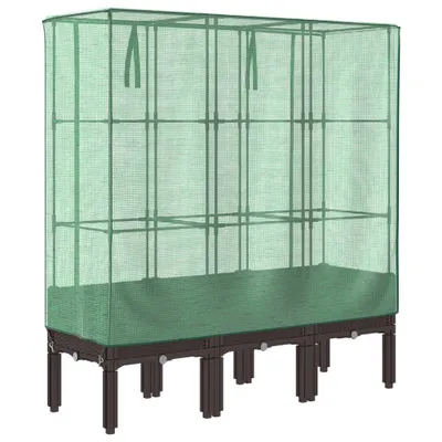 A raised garden bed with a greenhouse cover.