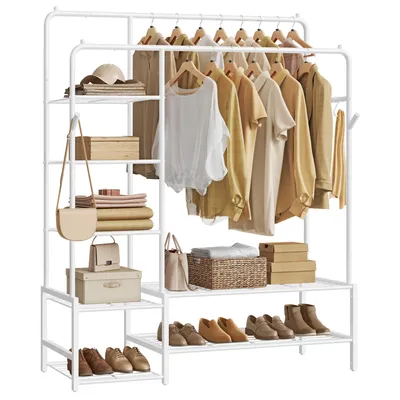 A white metal garment rack with clothes and accessories displayed on it.
