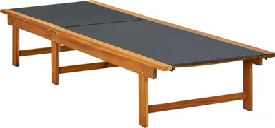 A wooden sun lounger with a dark fabric surface, shown from a slightly elevated side angle against a white background.