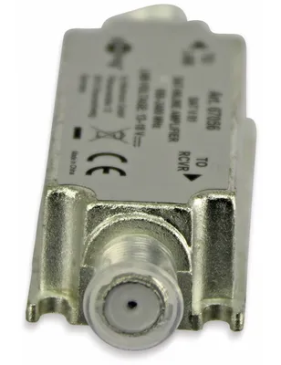 A close-up, angled view of a silver satellite antenna amplifier with visible text and markings.