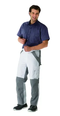 A man wearing work pants and a shirt, standing against a white background.