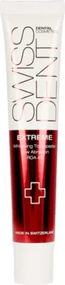A tube of Swissdent Extreme Whitening Toothpaste against a white background.