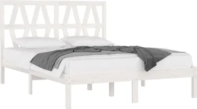 A white wooden bed frame with a geometric headboard is shown from the side with a white mattress and a grey blanket.