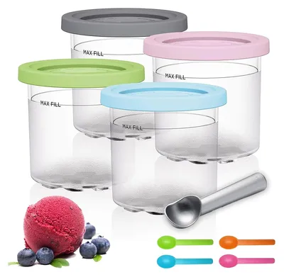 A set of four ice cream containers with different colored lids, an ice cream scoop, and a scoop of ice cream with blueberries.