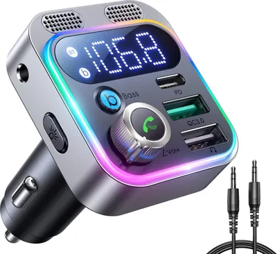 A close-up shot of a car FM transmitter with Bluetooth adapter.