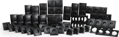 A collection of black electrical outlets and switches arranged on a white background.
