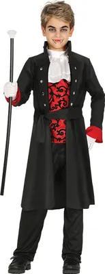 A young boy dressed in a vampire costume, holding a cane.