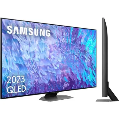 A Samsung QLED TV is shown from a front-side angle on a white background, with a side view of another TV to the right.