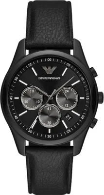 A black Emporio Armani chronograph watch with a black leather strap is shown against a black background.