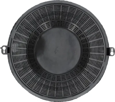 A top-down view of a black round charcoal filter for a range hood.