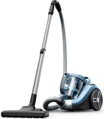 A blue and gray bagless cylinder vacuum cleaner with its hose and wand attached, shown against a white background.