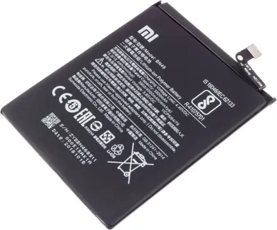 A black Xiaomi BN46 battery for a mobile phone, shown from a slightly elevated angle on a white background.
