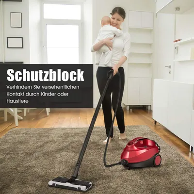 A woman is holding a baby while using a steam cleaner in a living room.