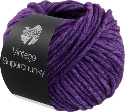 A ball of purple yarn with a black label.