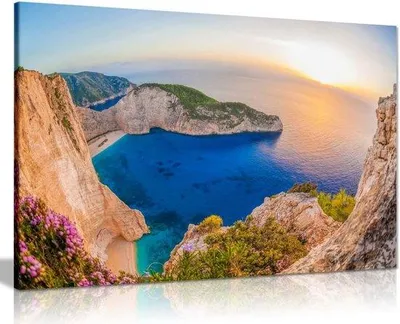 Produktbild von Famanu Leinwandbild Strand mit Schiffswrack bei Sonnenuntergang - A0