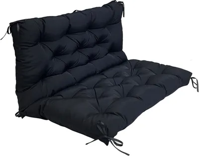 A black tufted cushion for a chair or bench, shown from a diagonal angle against a white background.