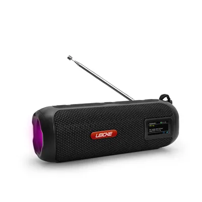A black portable speaker with an antenna and a small screen, set against a white background. Purple light emanates from one end of the speaker.