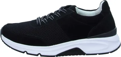 A side view of a black Gabor sneaker with a white sole.