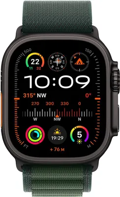 A close-up of a smartwatch face displaying time, compass, and activity metrics.