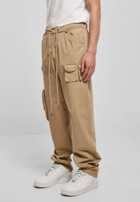 Zdjęcie produktu dla Spodnie Urban Classics Asymetric Pants w kolorze unionbeige – rozmiar 36