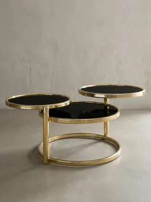 Produktbild von Runder Glastisch: Schwenkbare Glasplatten, Stahlgestell, 58-139 cm breit, Ø 38-47 cm, spiegelnde schwarze Glasplatten. Gold | Kadima Design