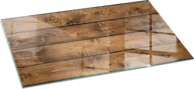 A rectangular glass cutting board with a wood plank pattern.