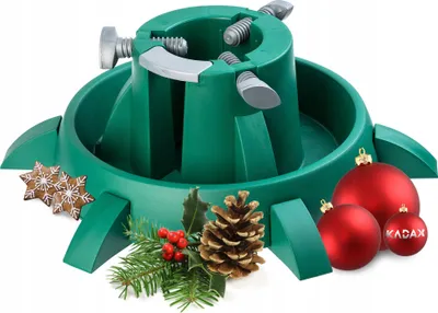 A green Christmas tree stand with decorative elements like pine cones, holly, gingerbread cookies, and red ornaments.