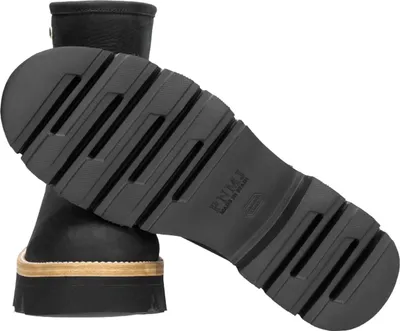 The sole of a black boot is shown against a white background.