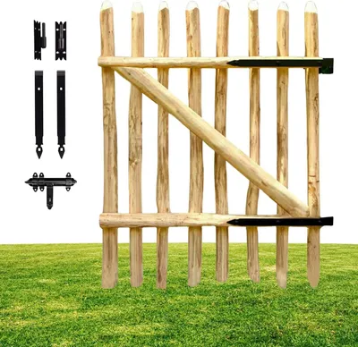 A wooden garden gate with black hardware, shown on a green grassy surface.