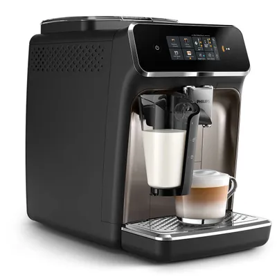 A Philips automatic coffee machine on a white background, preparing a latte.
