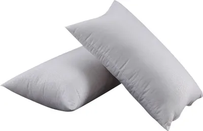 Two white pillows are shown against a white background.