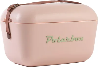 A pink Polarbox cooler with a brown leather strap and buckle is shown against a white background.